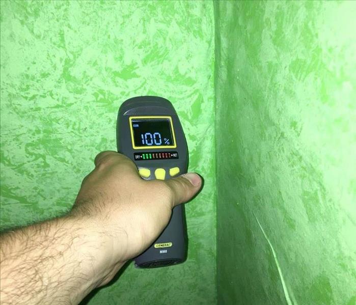 moisture meter reading at 100%