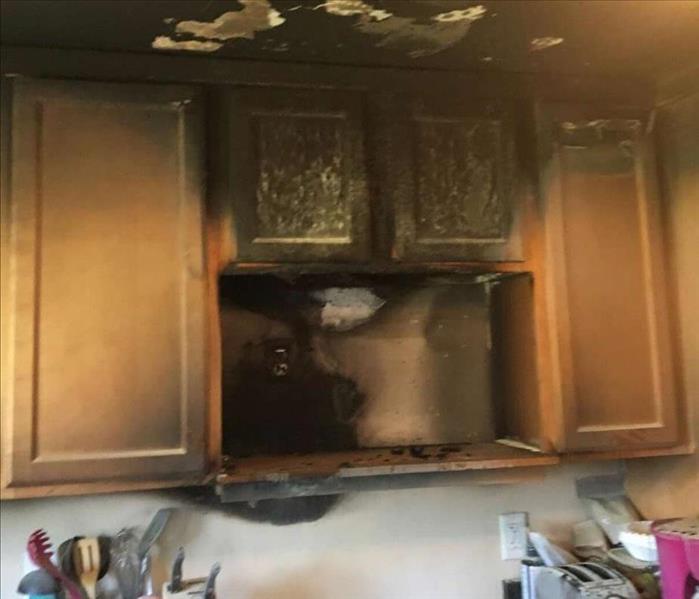 fire in microwave over stove