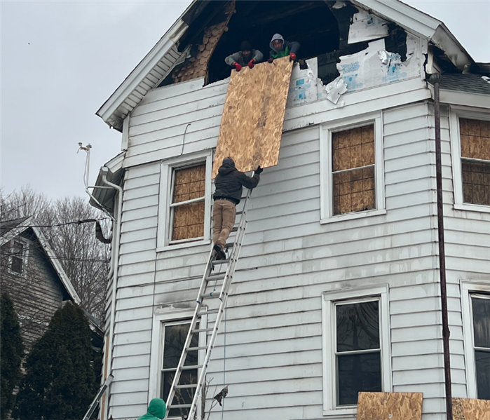 Board up in Southington, CT after a house fire.